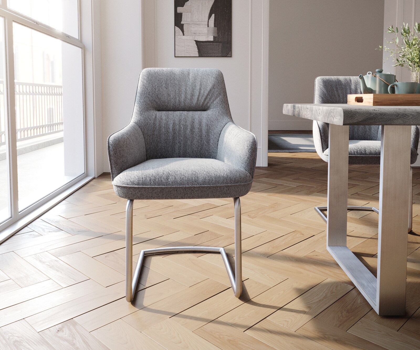 Sledemodel Zelia-Flex met armleuning structuurstof lichtgrijs sledemodel rond roestvrij staal pocketveer kern 1 Sledemodel Zelia-Flex met armleuning structuurstof lichtgrijs sledemodel rond roestvrij staal pocketveer kern 1