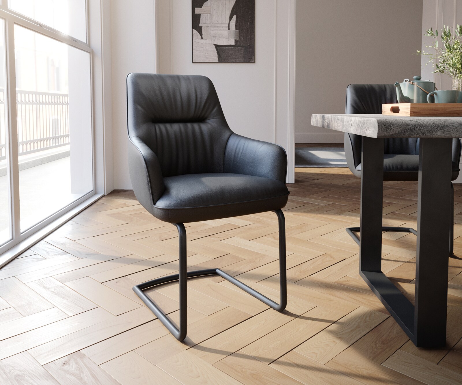 Sledemodel Zelia-Flex met armleuning echt leer zwart sledemodel rond zwart pocketveer kern