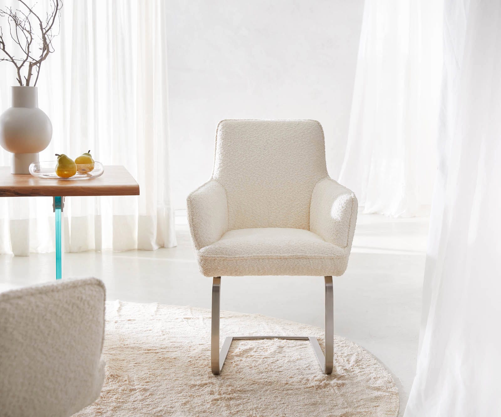 Sledemodel Heira-Flex met armleuning bouclé wit sledemodel vlak roestvrij staal pocketveer kern 1 Sledemodel Heira-Flex met armleuning bouclé wit sledemodel vlak roestvrij staal pocketveer kern 1