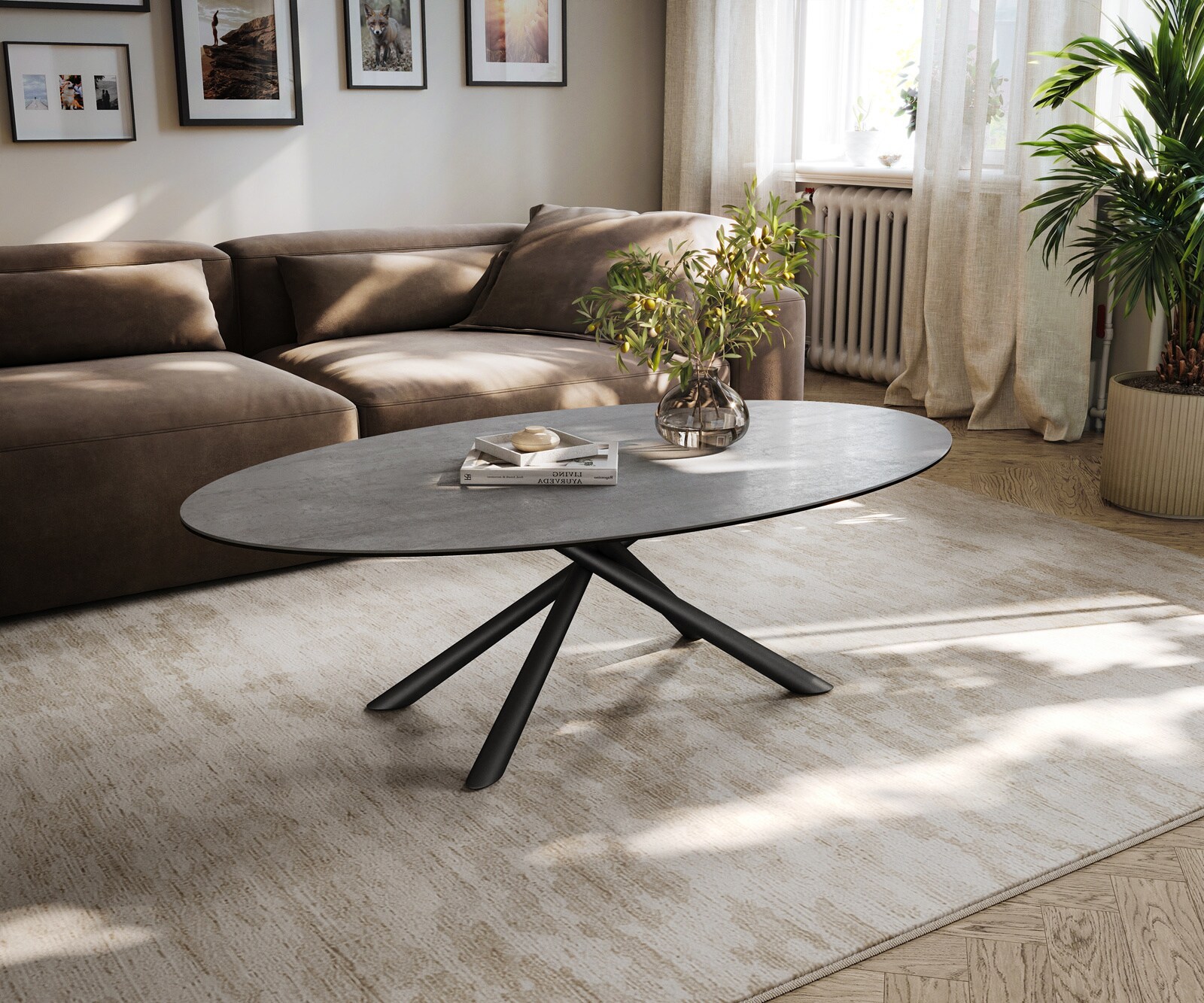 Salontafel Edge ovaal 140x80 cm keramiek beton grijs Sarity metaal zwart 1