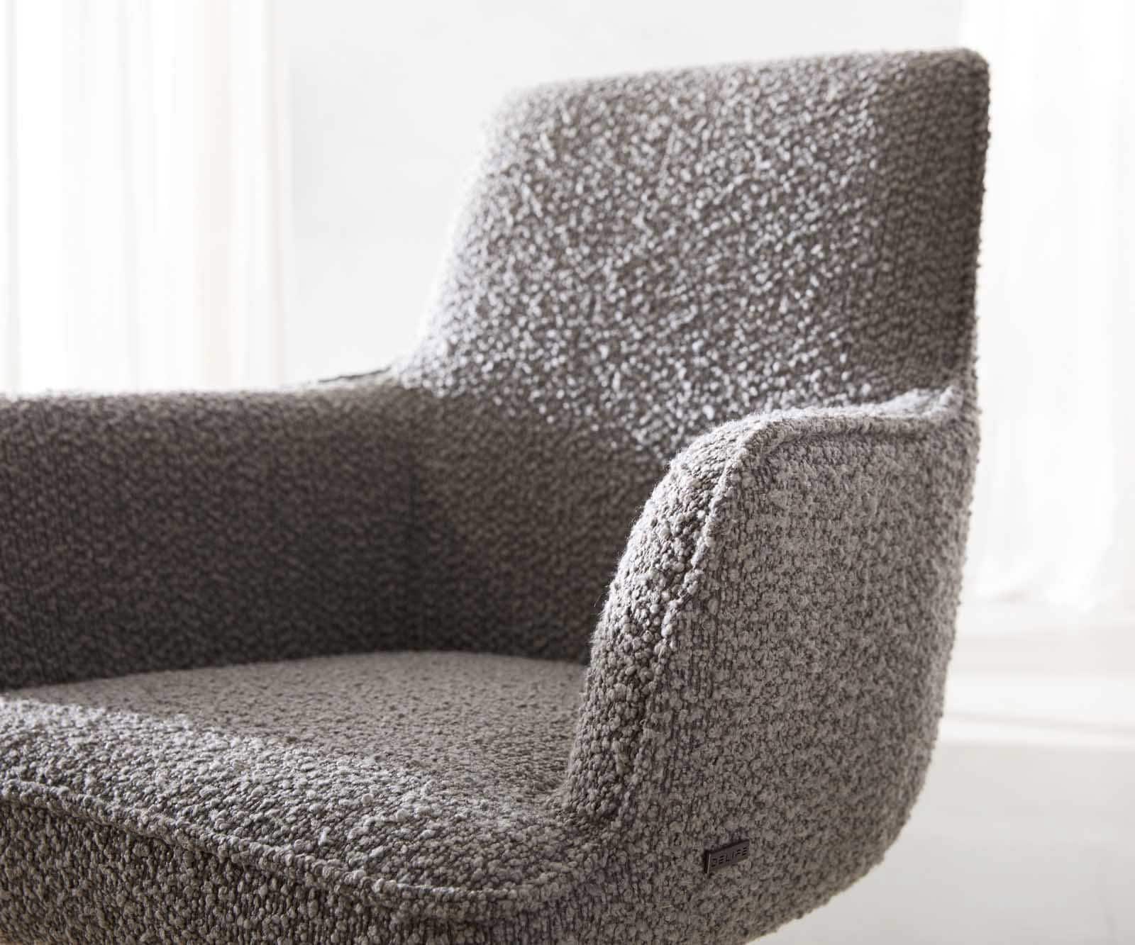 Eetkamerstoel Heira-Flex met armleuning bouclé zilver grijs slipframe zwart pocketveer kern 3 Eetkamerstoel Heira-Flex met armleuning bouclé zilver grijs slipframe zwart pocketveer kern 3