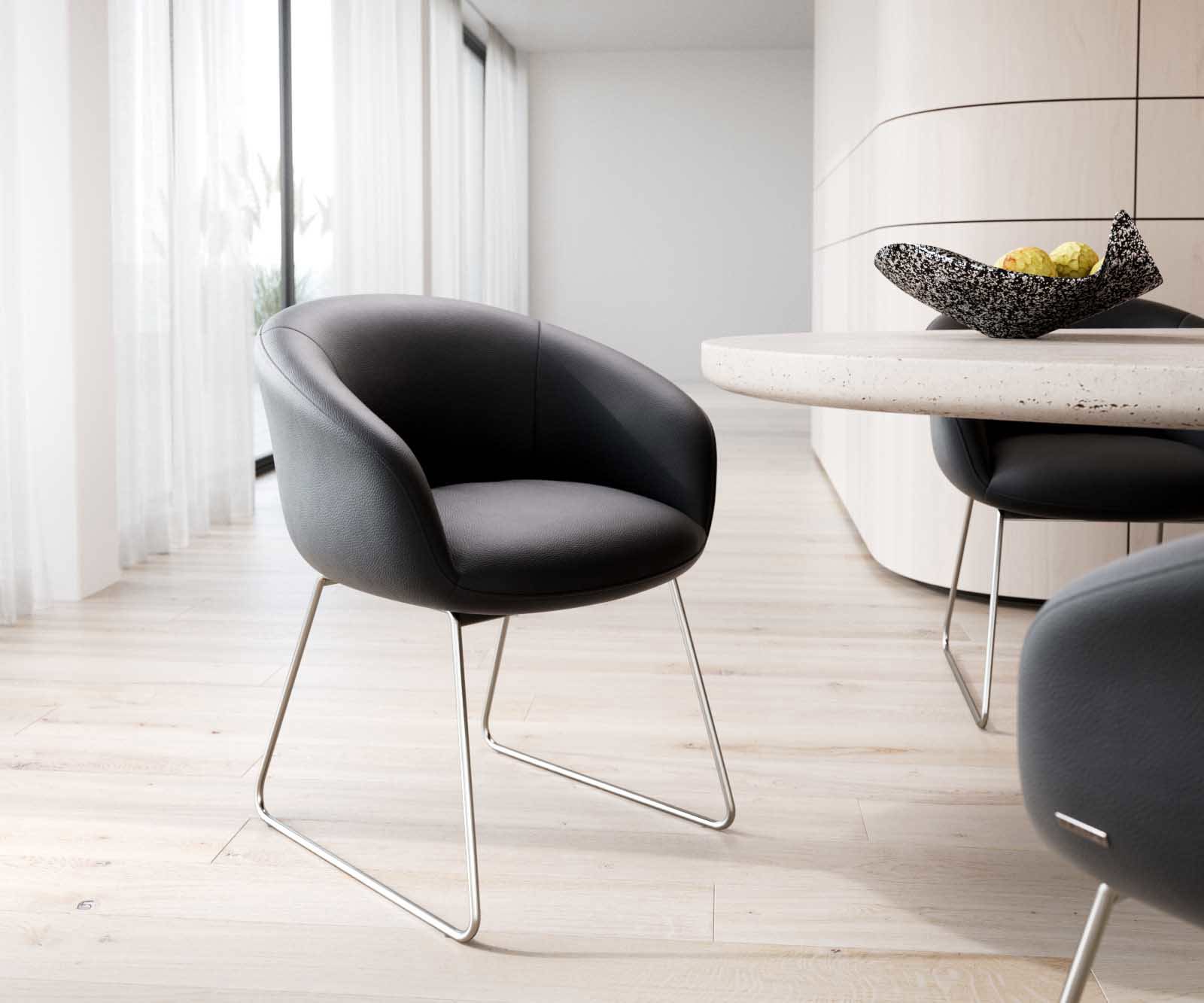 Eetkamerstoel Vinka-Flex met armleuning echt leer zwart slipframe roestvrij staal pocketveer kern Eetkamerstoel Vinka-Flex met armleuning echt leer zwart slipframe roestvrij staal pocketveer kern