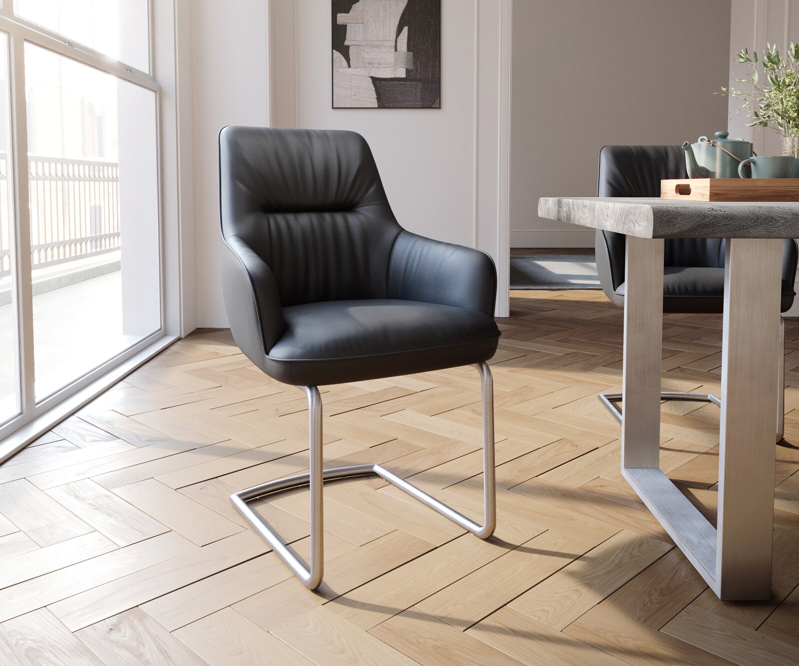 Sledemodel Zelia-Flex met armleuning echt leer zwart sledemodel rond roestvrij staal pocketveer kern Sledemodel Zelia-Flex met armleuning echt leer zwart sledemodel rond roestvrij staal pocketveer kern